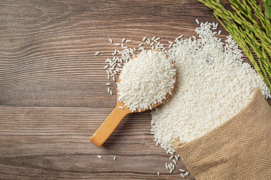 sack rice with rice wooden spoon rice plant 4 DTECH COMPANY- dvelopment technology